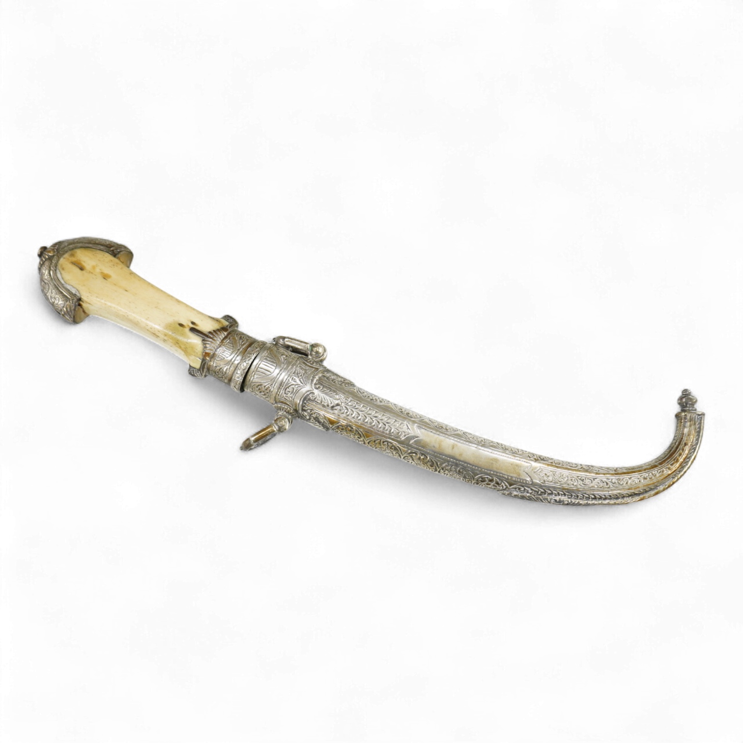 A silver mounted Moroccan dagger jambya, with silver sheath and hilt, mounts chased with foliate and floral designs, and one piece bone grip, blade as found, overall length 42cm